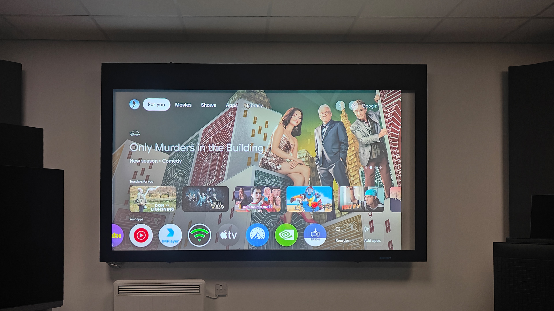 Epson EF-72 home cinema projector image showing Google TV