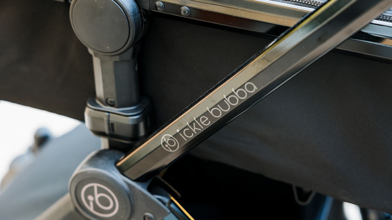 A close-up of the Ickle Bubba Stomp Luxe Elements pram chassis