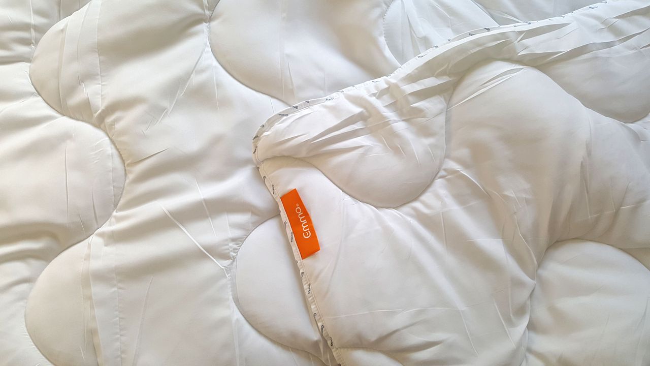 The Emma Cloud Duvet with its orange brand label showing