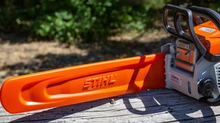 The Stihl MS170 with its blade guard enabled.