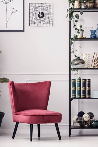 Jewel chair with a white wall