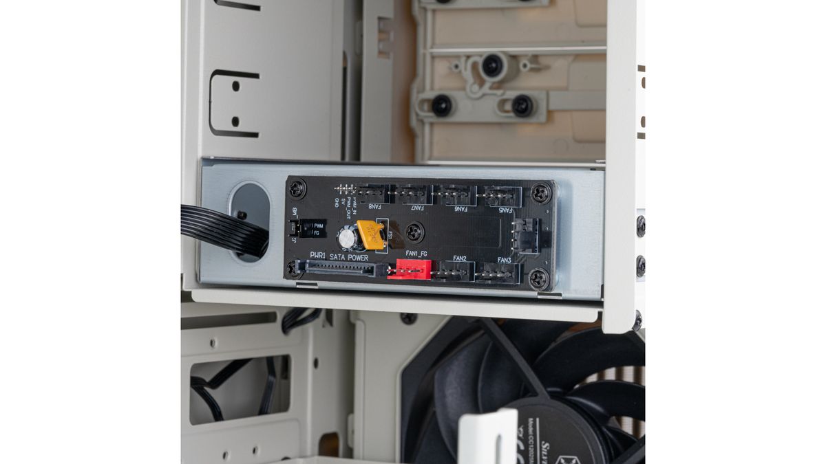 A promotional image of the SilverStone SST-FLP02 PC case, highlight its retro-styled features