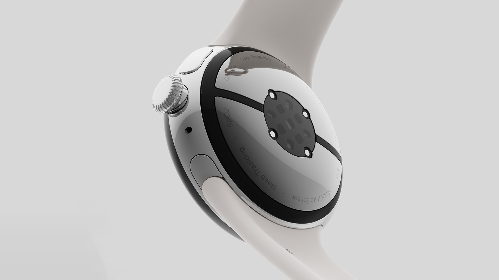 The glass rear of the Google Pixel Watch 2 on a beige background