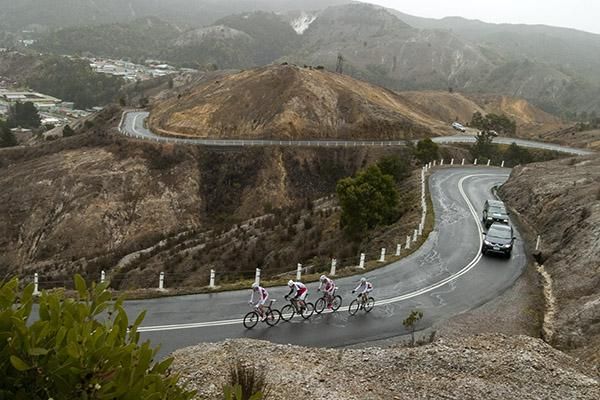 Riders encountered a stretch of road named '99 bends' in Queenstown on Tasmania's rugged West Coast for the stage three team time trial.