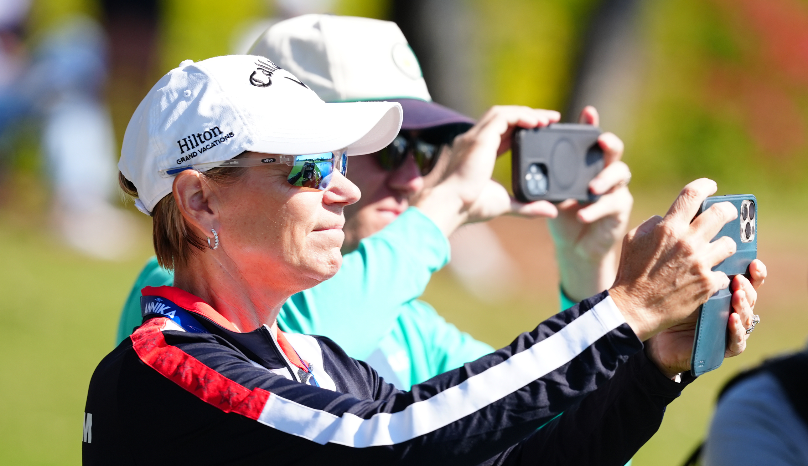 Tournament host Annika Sorenstam takes a picture with her phone