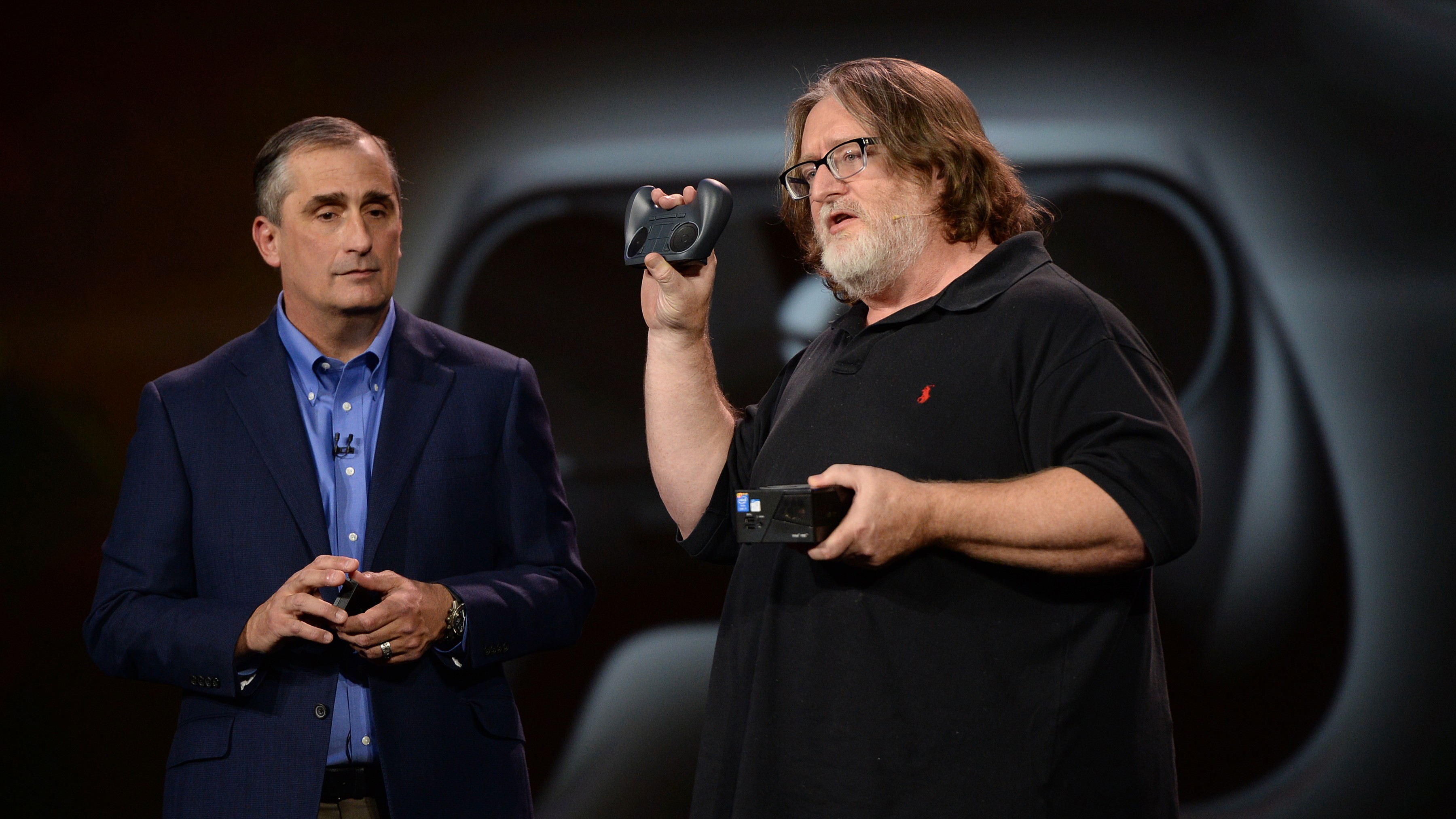 Gabe Newell, co-founder of game-maker Valve, discusses Intel's role in Valve's gaming development, during Krzanich's keynote address at the 2014 International CES at The Venetian hotel.