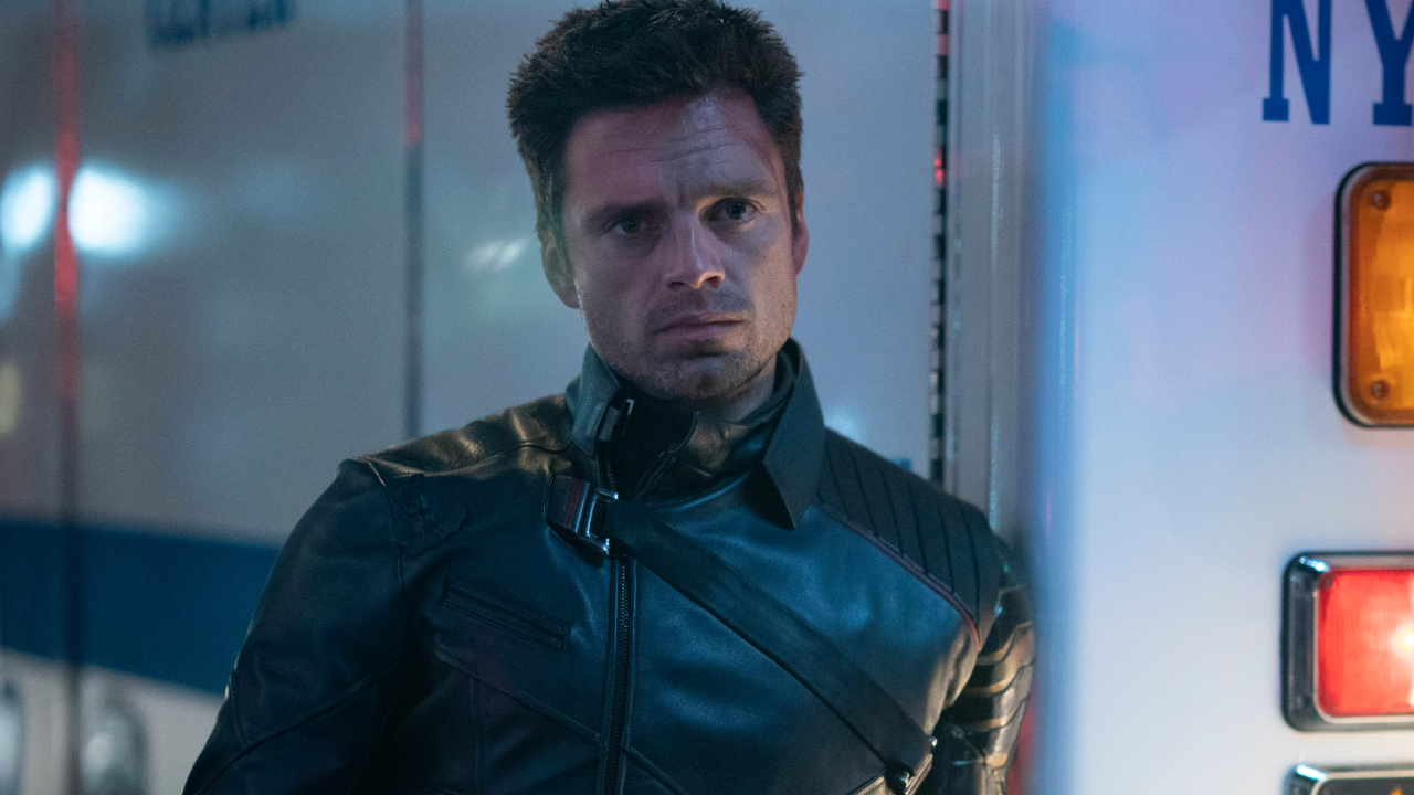 Sebastian Stan leaning against an ambulance with a look of concern in The Falcon and the Winter Soldier.