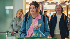 Meg Stalter the airport in Too Much