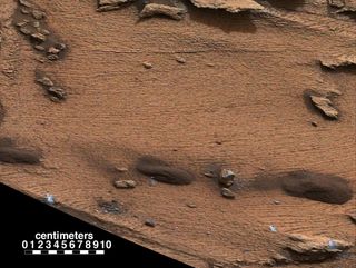 Curiosity rover spotted an example of a thin-laminated, evenly stratified rock type that occurs in the "Pahrump Hills" outcrop at the base of Mount Sharp on Mars. Image released Dec. 8, 2014.