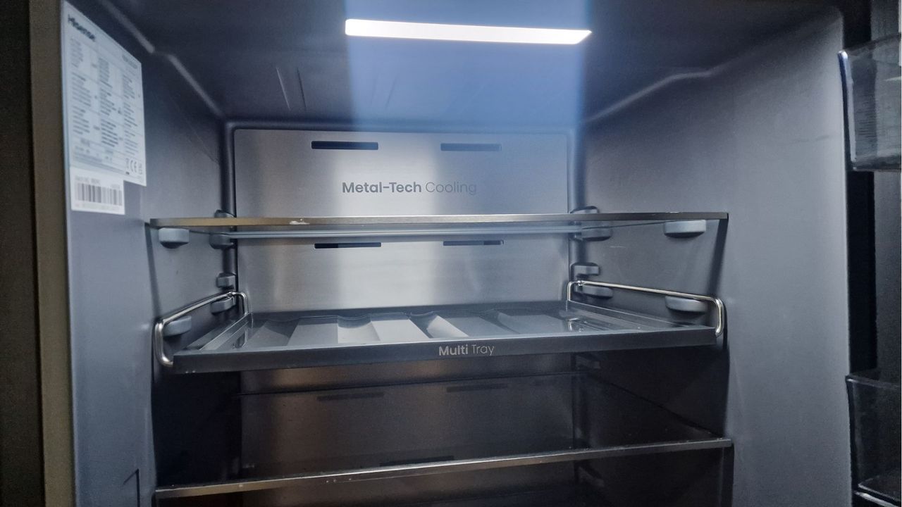 Hisense RB5K330GSFC in a green modern kitchen