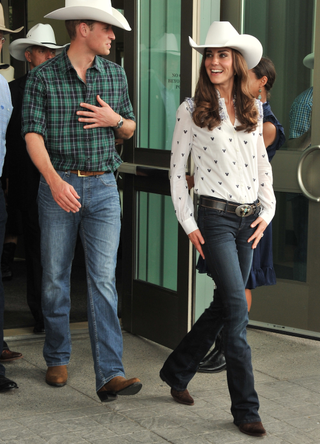 Prince William, Duke of Cambridge and Catherine, Duchess of Cambridge watch traditional Calgary Stampede activities at the BMO Centre on July 7, 2011 in Calgary, Canada