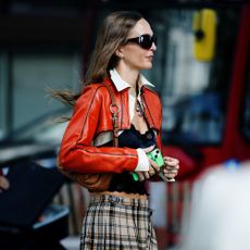 London Fashion Week street style trends: checked skirts.