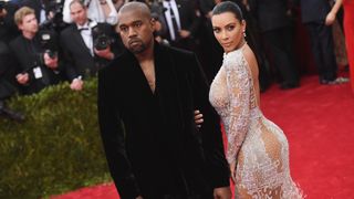 new york, ny may 04 kanye west l and kim kardashian attend the china through the looking glass costume institute benefit gala at the metropolitan museum of art on may 4, 2015 in new york city photo by mike coppolagetty images