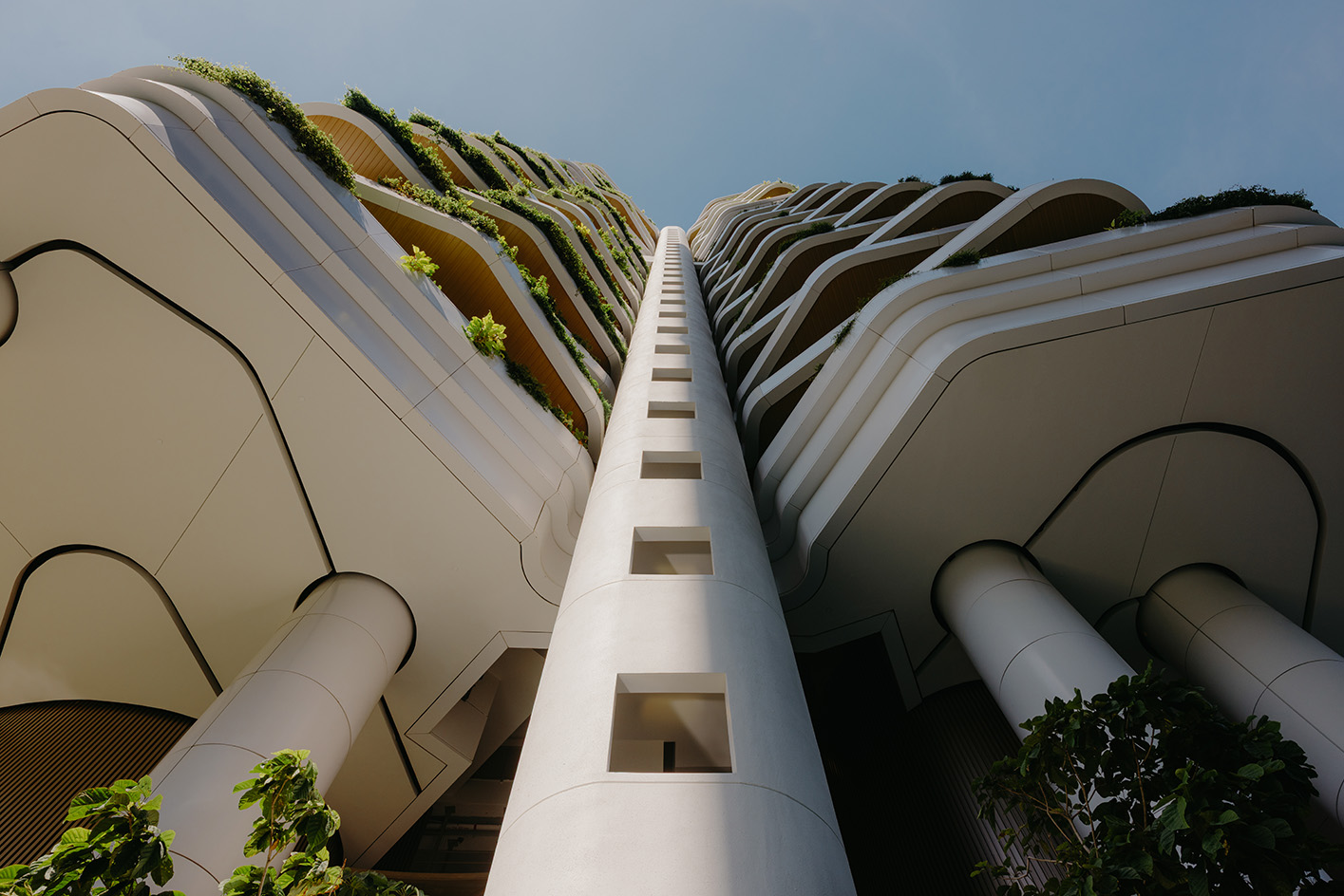 Park Nova, a tower with a vertical garden in Singapore, showing tropical greenery on balconies