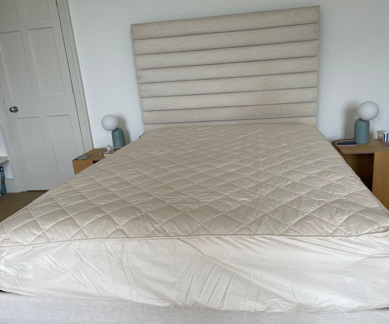 Woolroom Deluxe Washable Mattress Topper on the bed