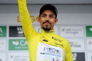 LAGOAPRAIA DO CARVOEIRO ALGARVE PORTUGAL FEBRUARY 19 Daniel Martinez of Colombia and Team INEOS Grenadiers celebrates at podium as Yellow Leader Jersey winner during the 49th Volta ao Algarve em Bicicleta 2023 Stage 5 a 244km individual time trial stage from Lagoa to Lagoa VAlgarve2023 on February 19 2023 in Lagoa Algarve Portugal Photo by Tim de WaeleGetty Images