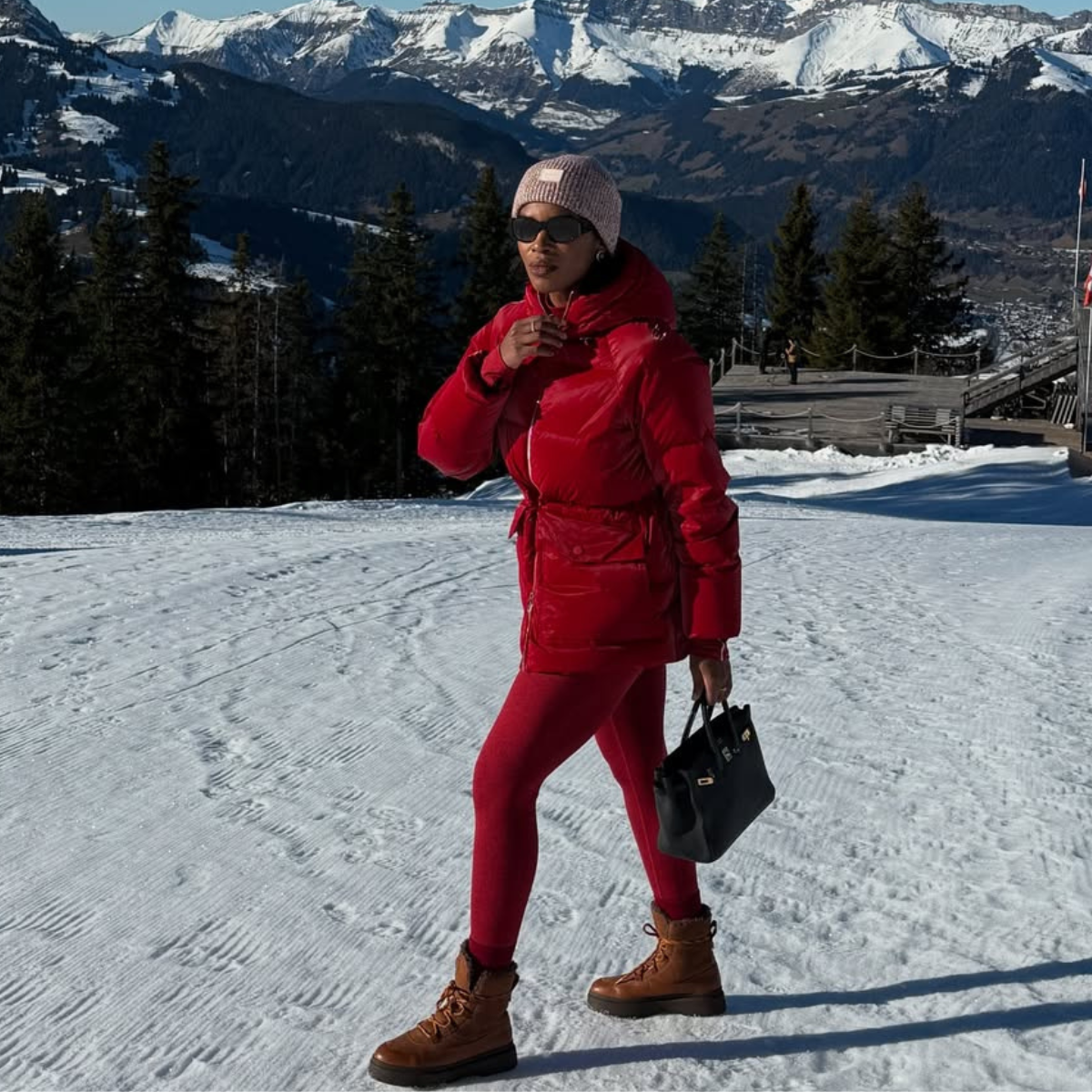 @nlmarilyn wears red leggings red ski jacket