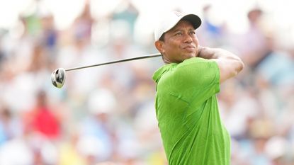 Tiger Woods hits a golf shot