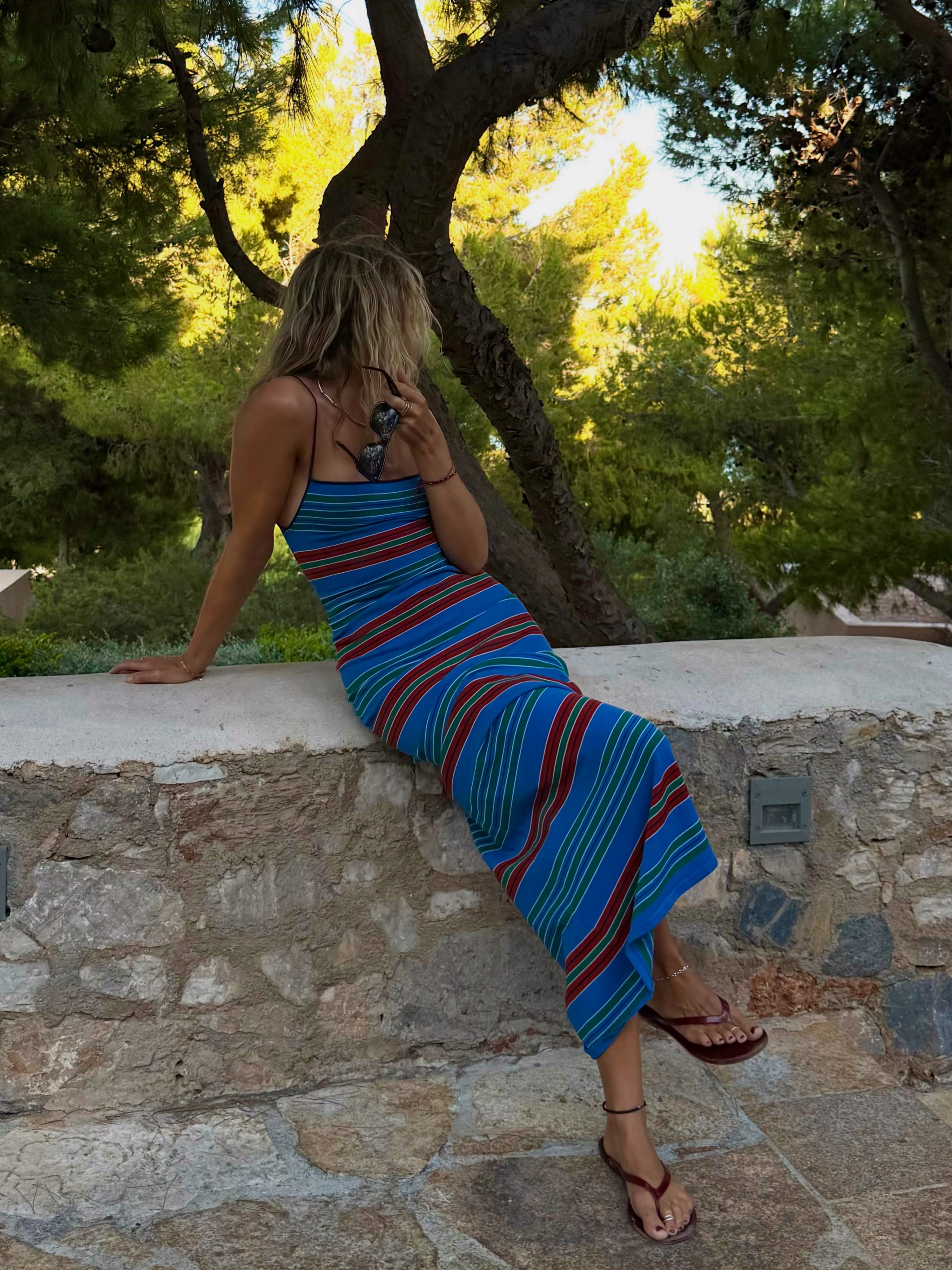 An image of a woman wearing striped dress for summer 2026