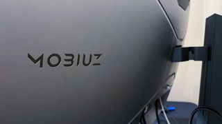 BenQ Mobiuz EX3415R on a gaming desk