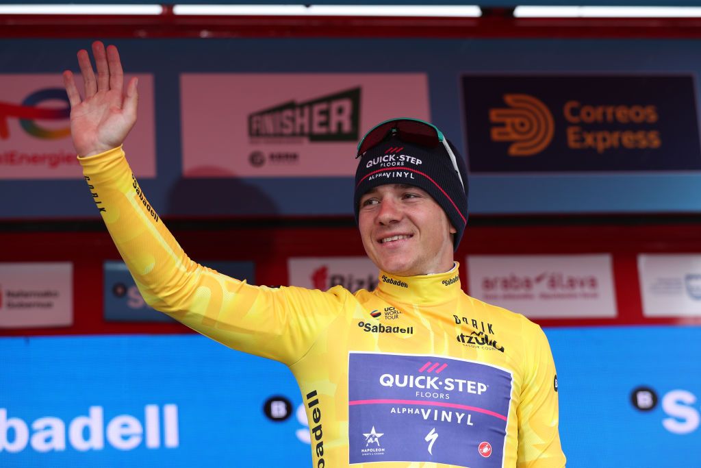 MALLABIA SPAIN APRIL 08 Remco Evenepoel of Belgium and Team QuickStep Alpha Vinyl celebrates at podium as Yellow Leader Jersey winner during the 61st Itzulia Basque Country 2022 Stage 5 a 1638km stage from Zamudio to Mallabia 305m itzulia WorldTour on April 08 2022 in Mallabia Spain Photo by Gonzalo Arroyo MorenoGetty Images