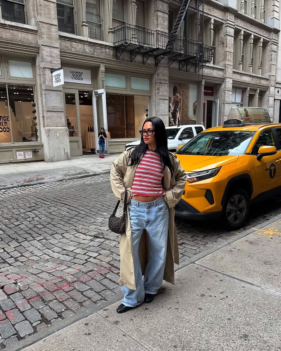 Woman wearing loafers with jeans outfit 2025.
