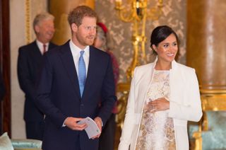 Prince Harry, Duke of Sussex and Meghan, Duchess of Sussex attend a reception to mark the 50th Anniversary of the investiture of The Prince of Wales
