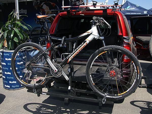 The new Thule Doubletrack hitch-mounted carrier promises much of the functionality of the upscale T2 but at a lower price.