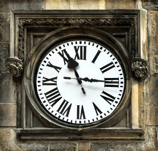 A medieval clock in Prague, Czech Republic, has Roman numerals on its face.