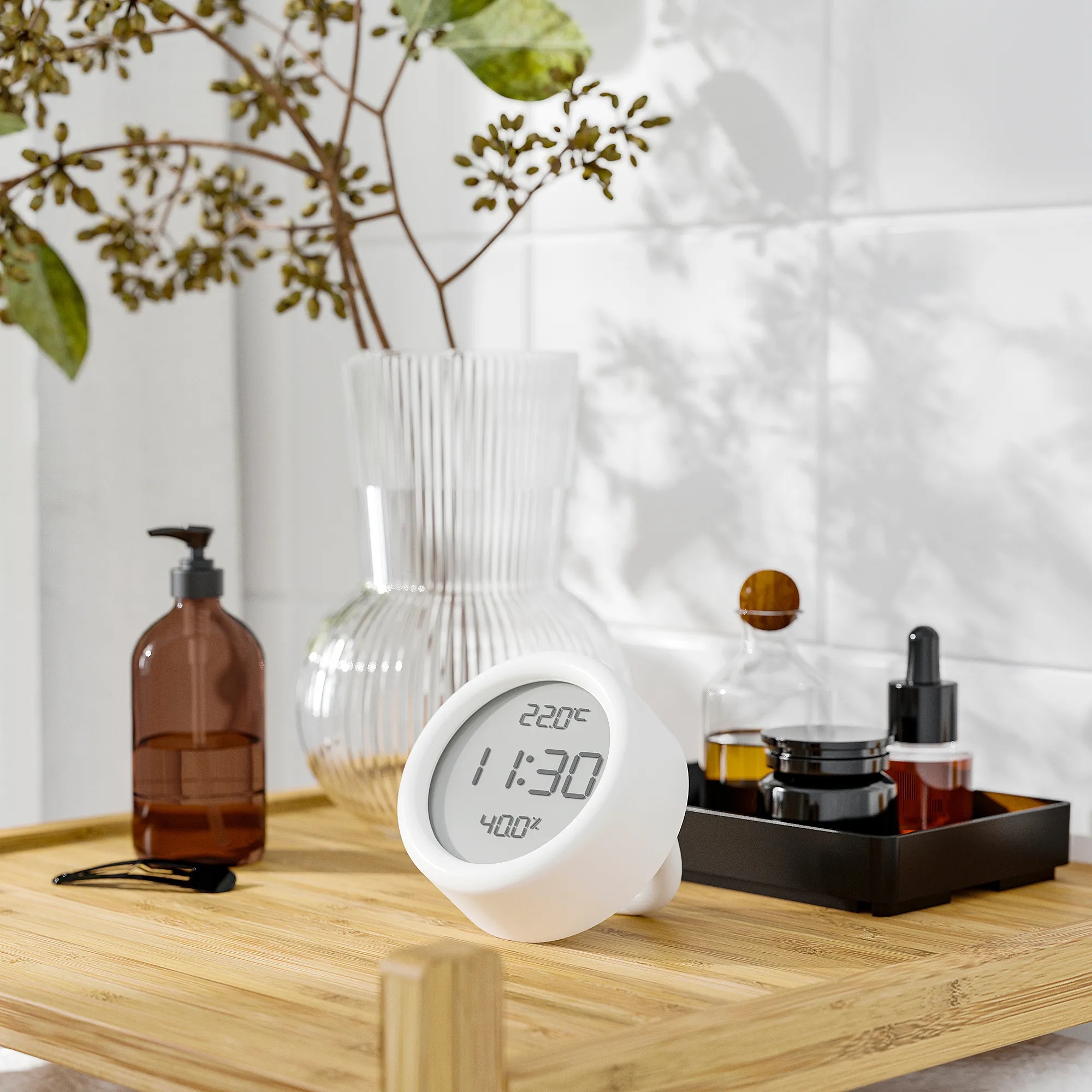 a temperature sensor clock on a tabletop i na bathroom