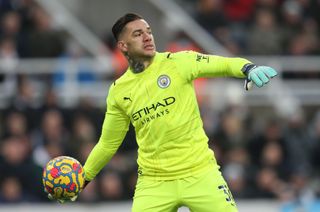 Goalkeeper Ederson throws the ball while playing for Manchester City, 2021