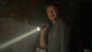 Joel (Pedro Pascal) with a flashlight in The Last Of Us
