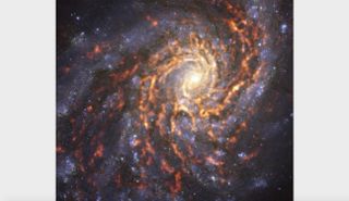 The spiral galaxy NGC 4254, also known as Messier 99, is located 55 million light-years away in the constellation Coma Berenices.