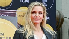 Michelle Pfeiffer With Handprint And Footprint In Cement Ceremony At TCL Chinese Theatre