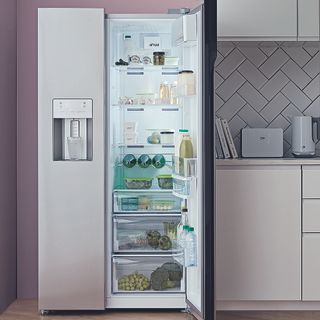 Smart refrigerator with kitchen and white cabinet