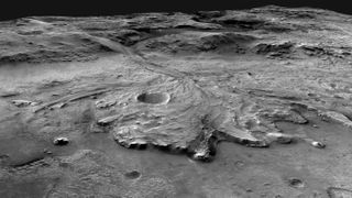 This oblique view looks to the west from above the Jezero crater floor, over the fan-shaped delta deposit, and into the valley that cuts through the crater rim.
