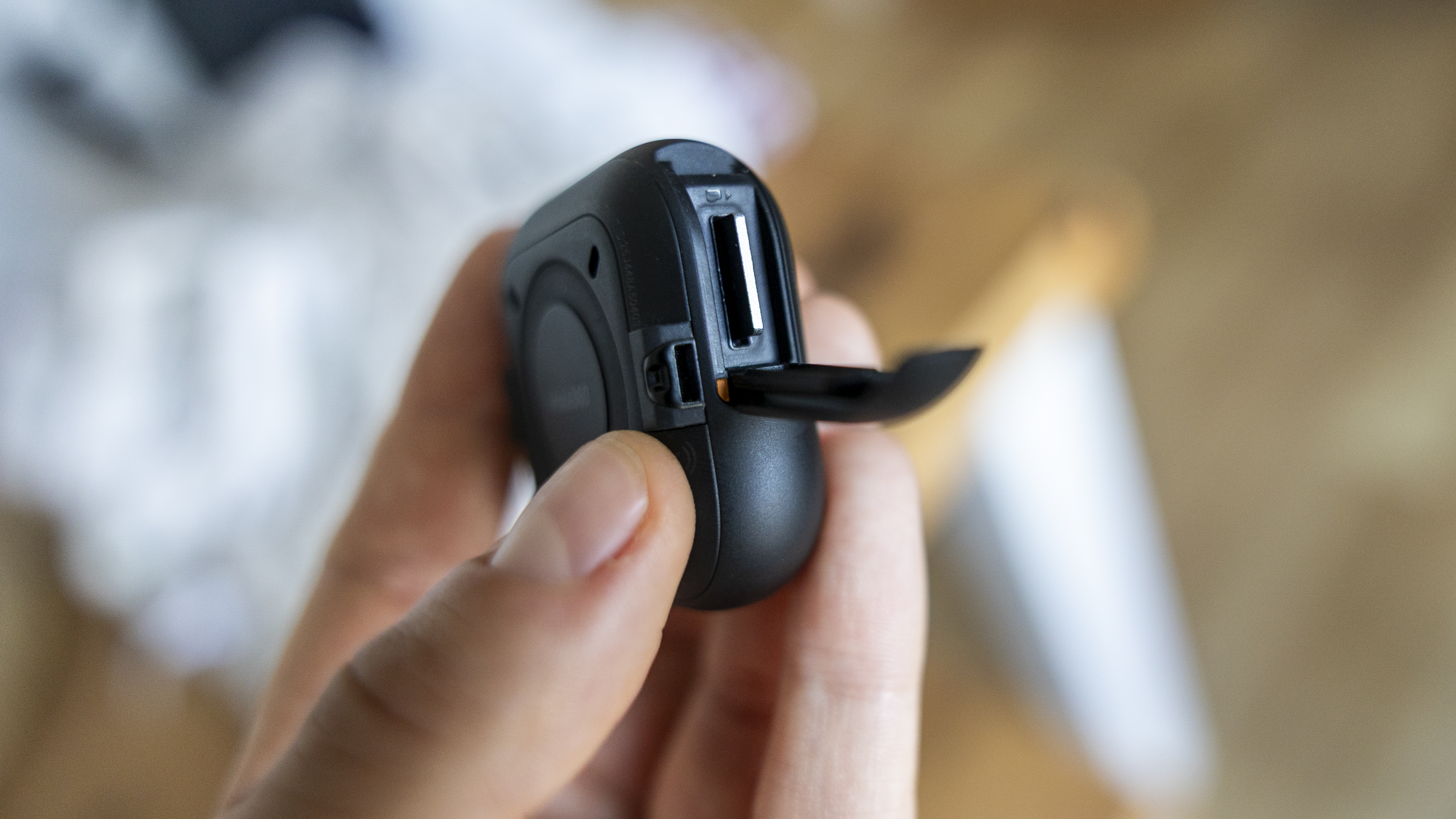 A close-up of the microSD card slot on the Insta360 GO Ultra