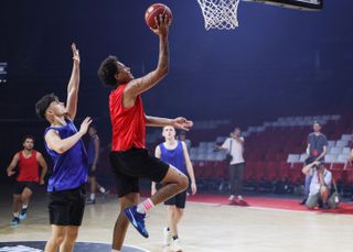 Canon EOS R1 sample image: an action shot of basketball players