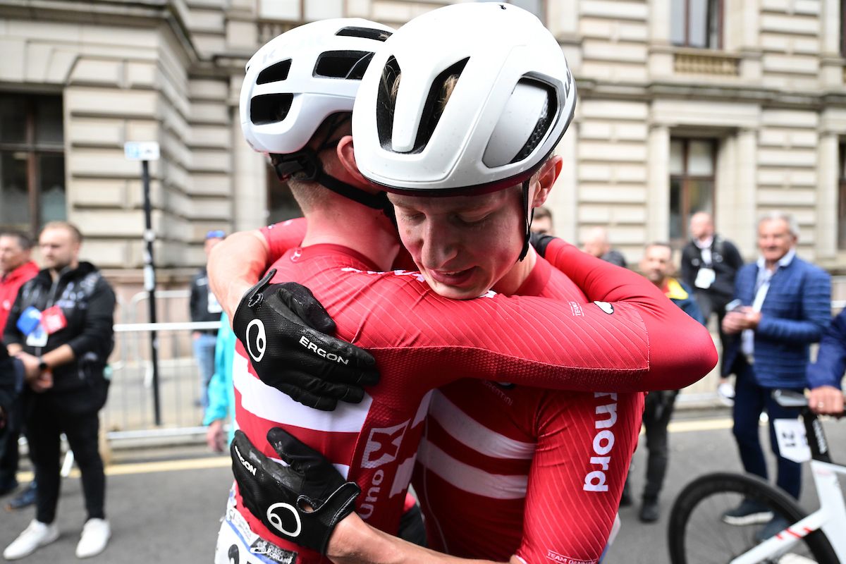 2023 UCI Cycling World Championships, Men's Junior Road Race, Glasgow, Lanarkshire, Scotland - Denmark's Albert Philipsen is congratulated on winning the Men's Junior Road Race.