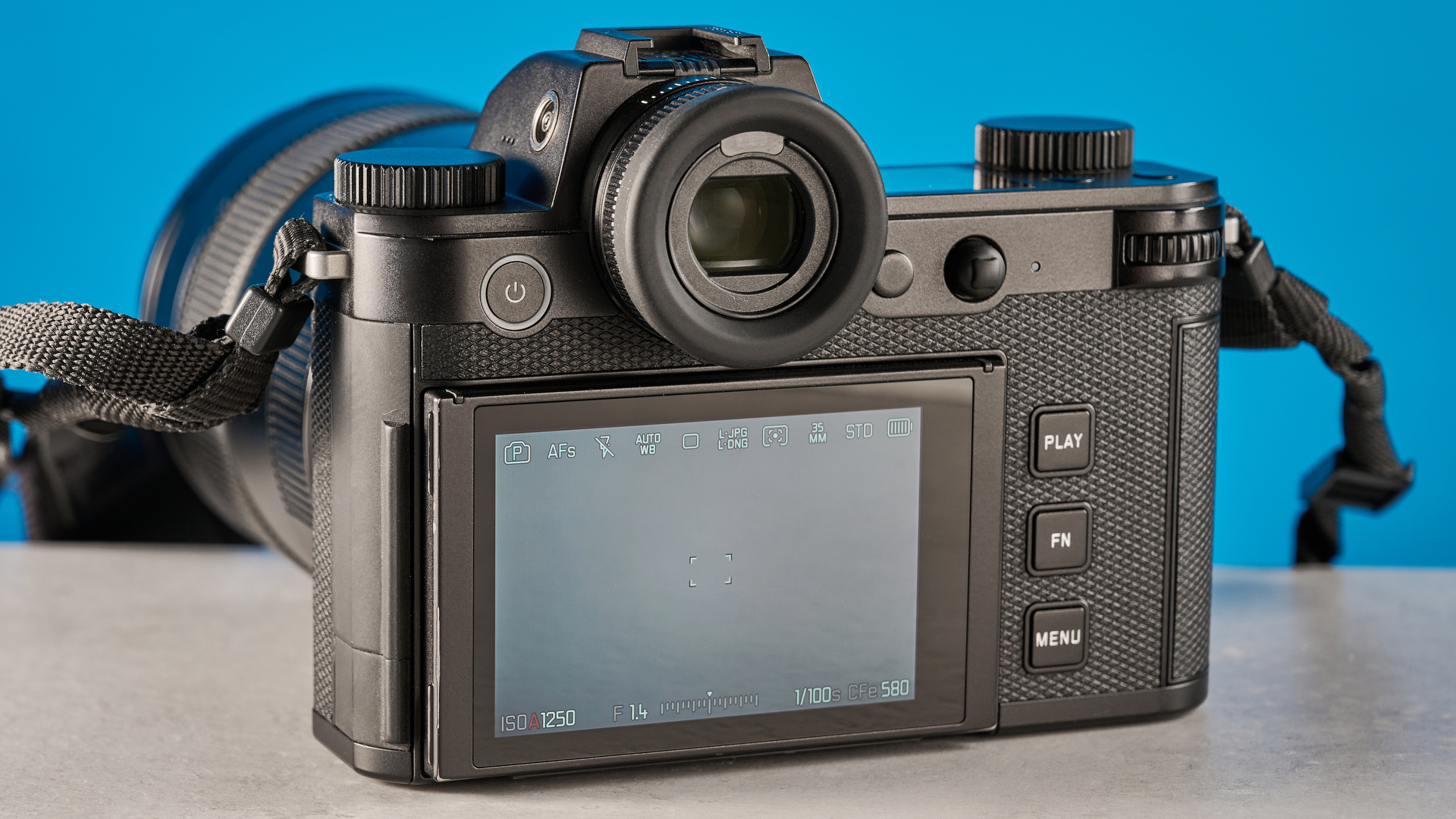 A black Leica SL3 mirrorless full frame camera