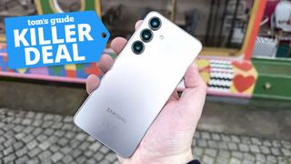 Galaxy S25 held in the hand.