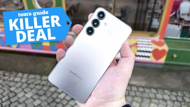 Galaxy S25 held in the hand.