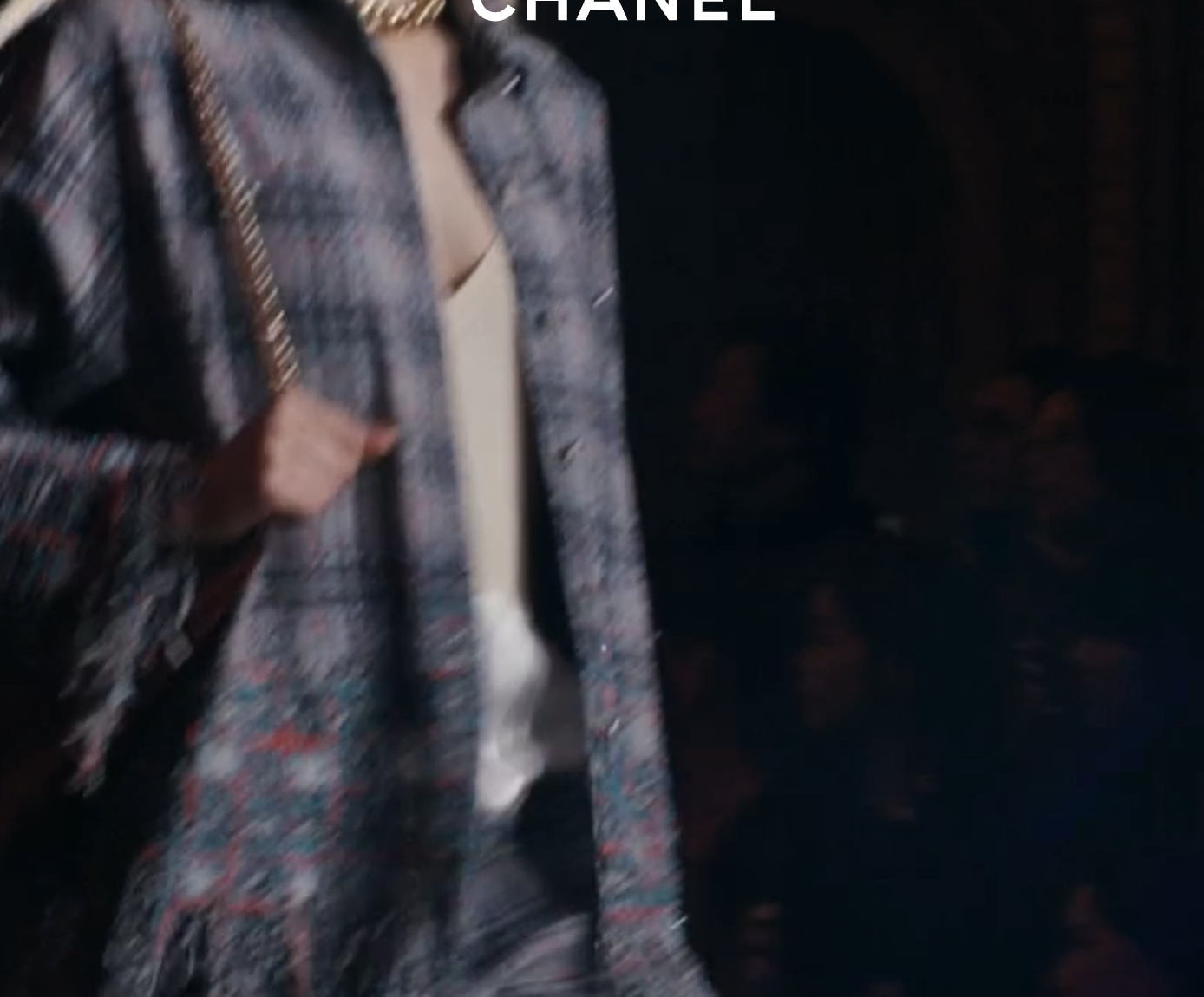 a plaid shirt from Chanel on the runway