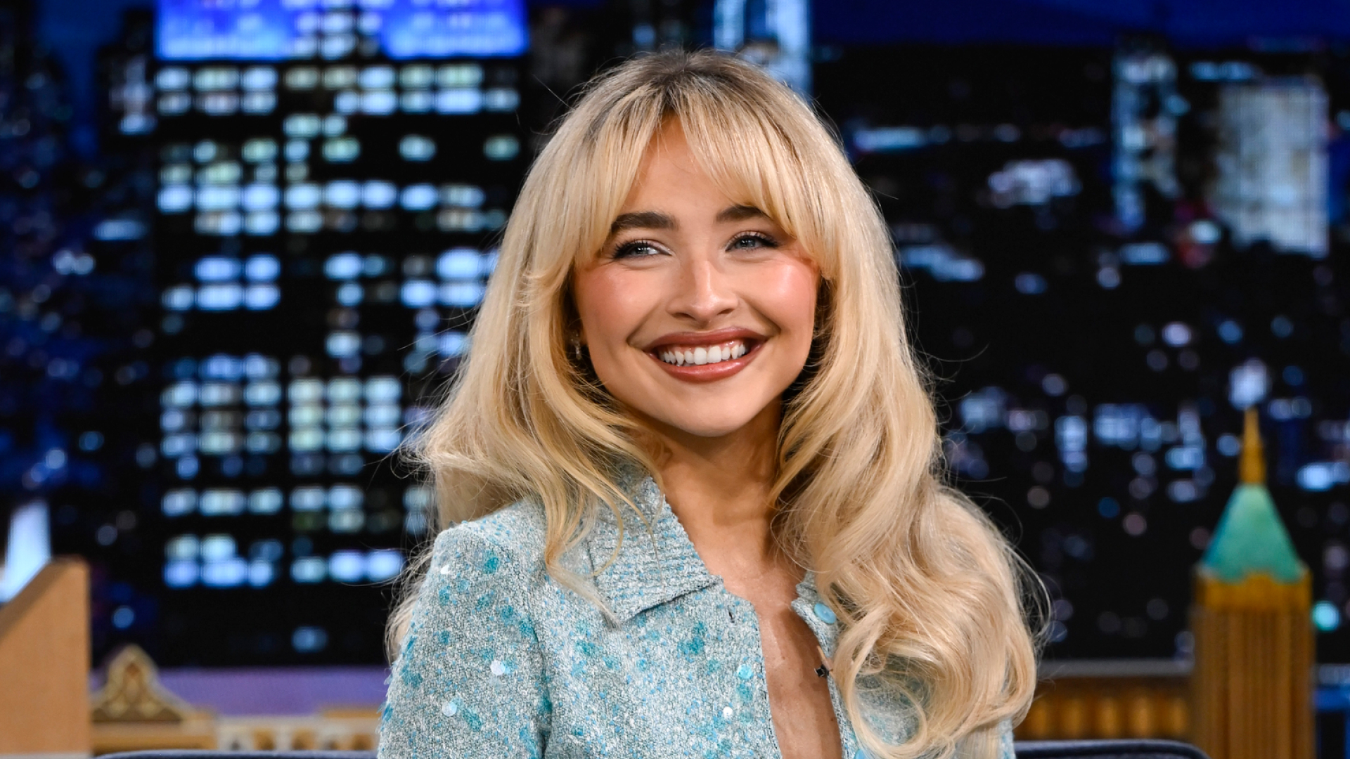 Sabrina Carpenter smiling at the camera