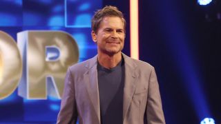 Rob Lowe smiling on stage hosting Fox's The Floor