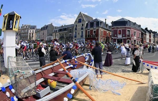 The peloton makes its way through a town along the French coast.