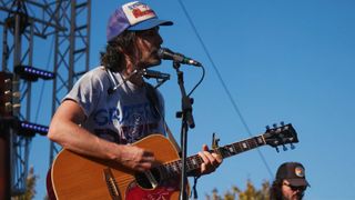 Eric Earley performs onstage