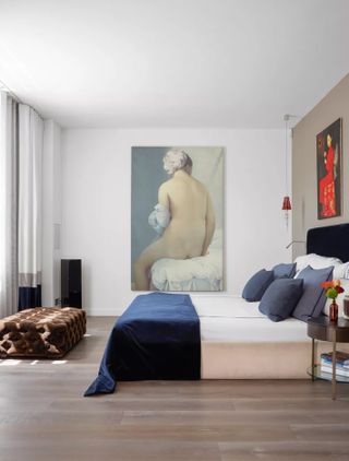 Minimalist modern bedroom with large artwork