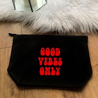 Good Vibes only make-up bag, designed to store sex toys in