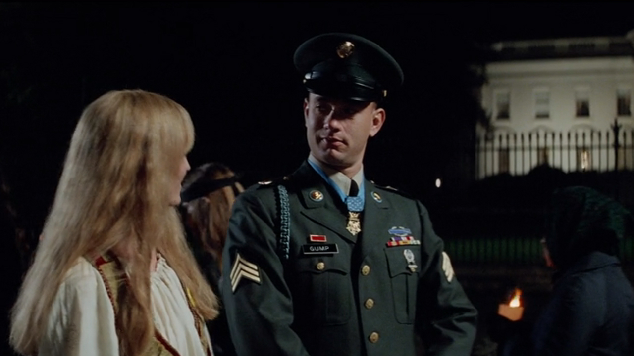 Tom Hanks in a military uniform walking and talking to Robin Wright in front of the White House in Forrest Gump.